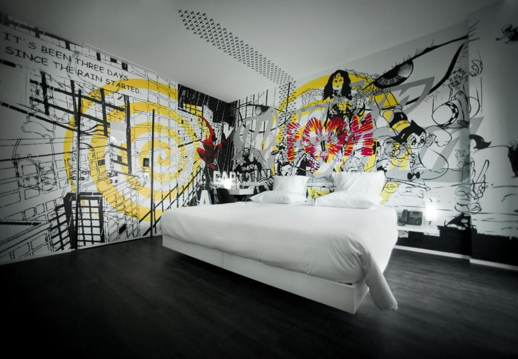 Postel nebo postele na pokoji v ubytování Design & Wine Hotel