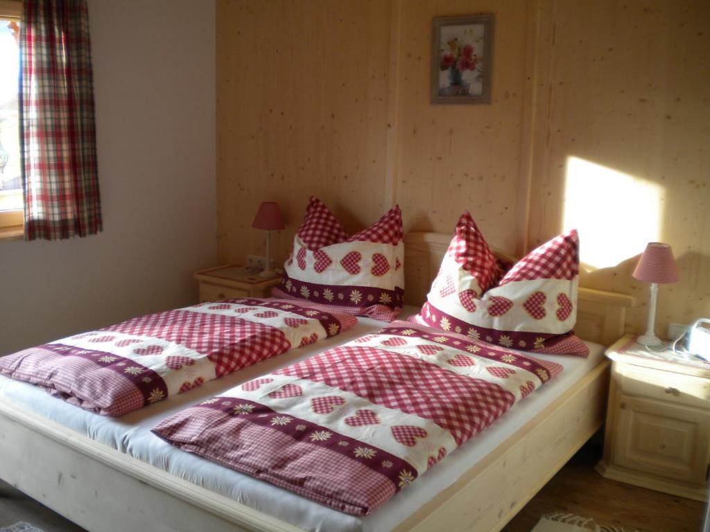 Postel nebo postele na pokoji v ubytování Bergpension-Ebental