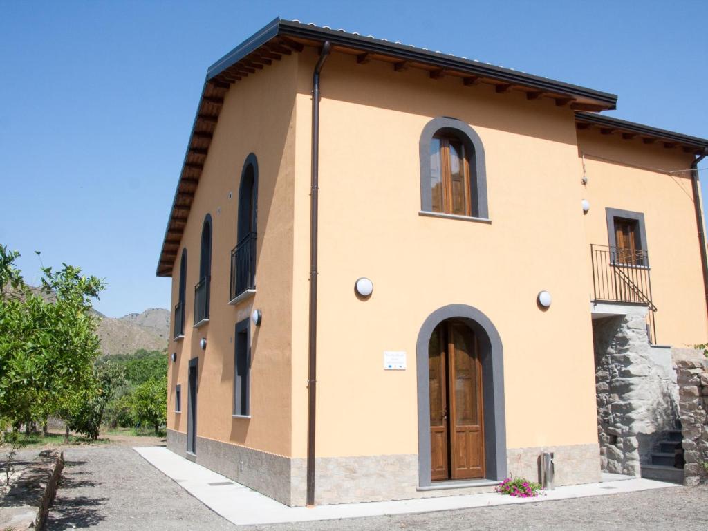 a villa with a view of the house at La Porta delle Gole in Motta Camastra