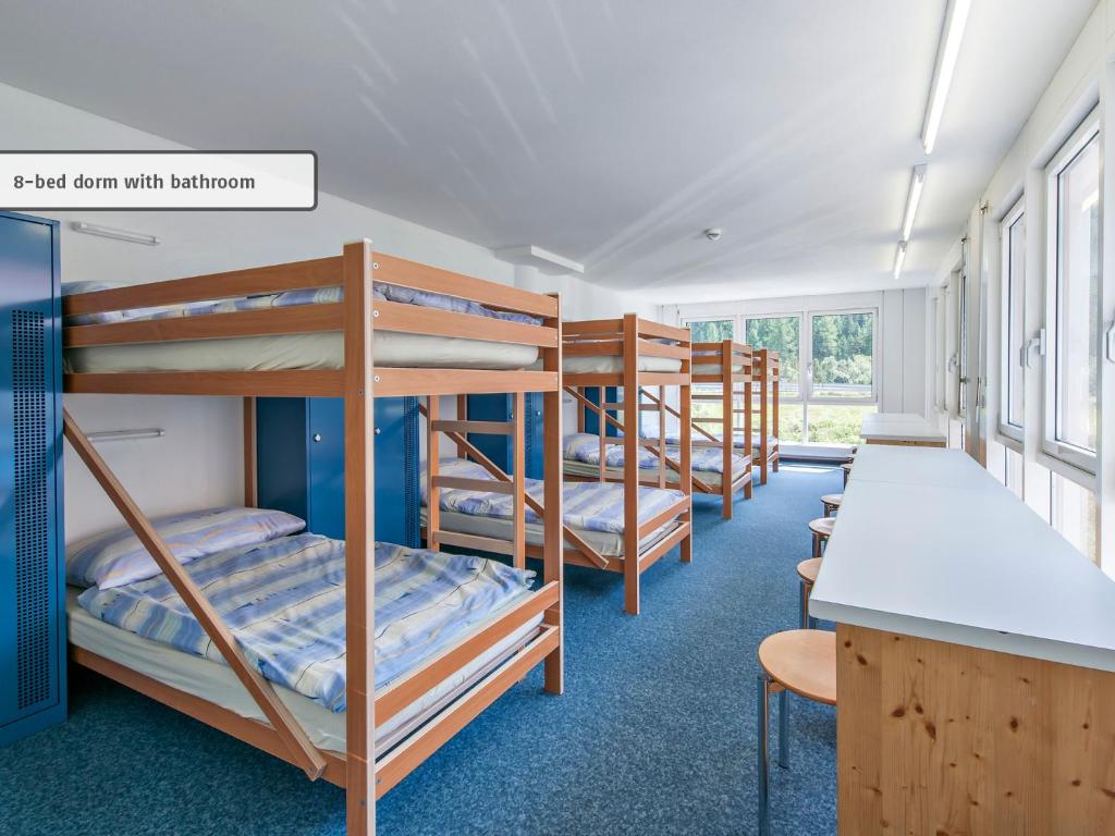 Postel nebo postele na pokoji v ubytování Hostel INN LODGE