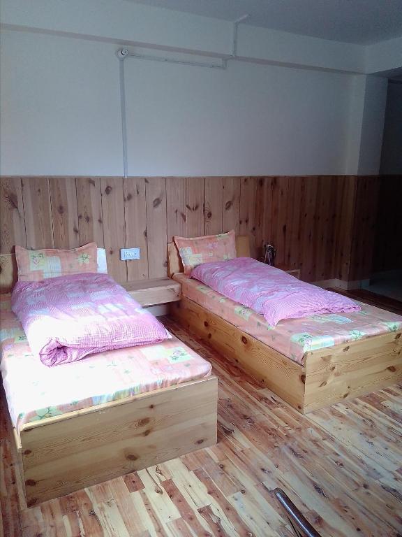 Postel nebo postele na pokoji v ubytování Hotel Yak Jispa