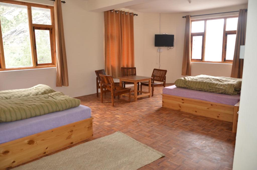 Postel nebo postele na pokoji v ubytování Hotel Yak Jispa