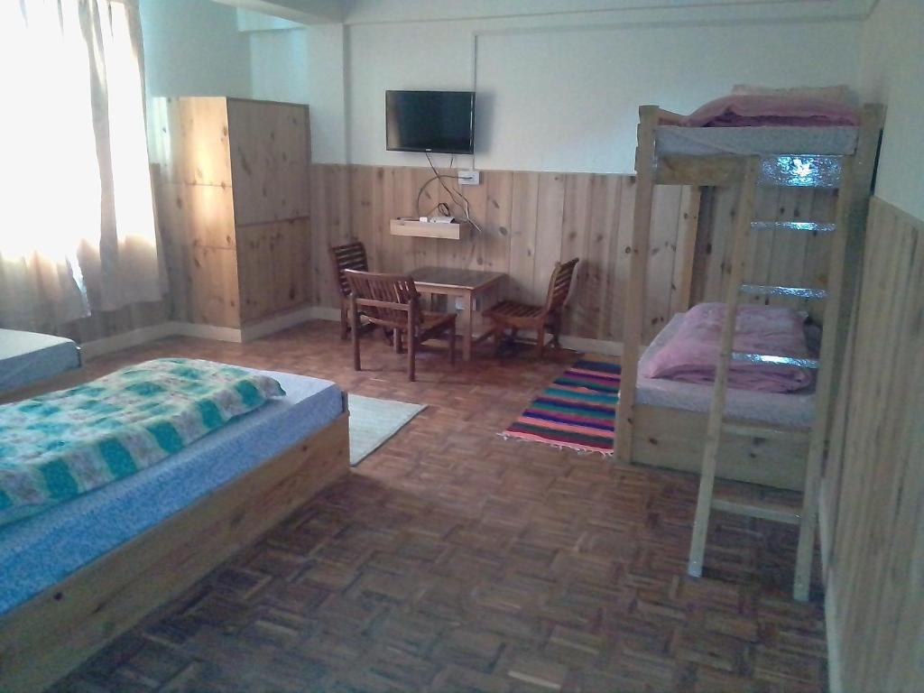 Postel nebo postele na pokoji v ubytování Hotel Yak Jispa