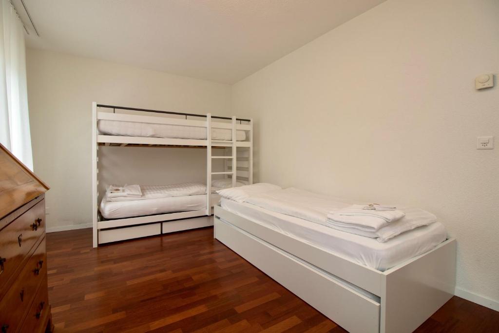 Postel nebo postele na pokoji v ubytování Chalet Goldenhorn