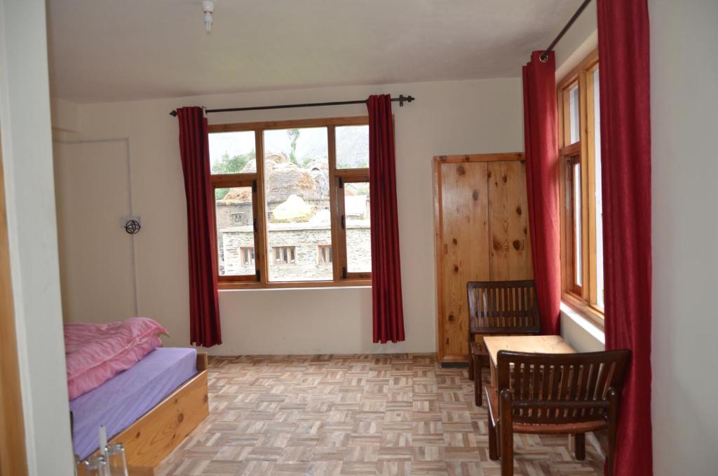 Postel nebo postele na pokoji v ubytování Hotel Yak Jispa