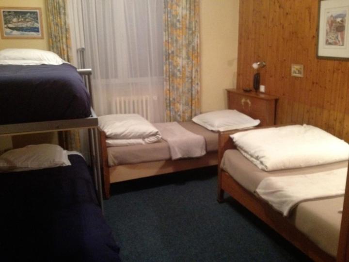 Postel nebo postele na pokoji v ubytování Hôtel Restaurant Wolf