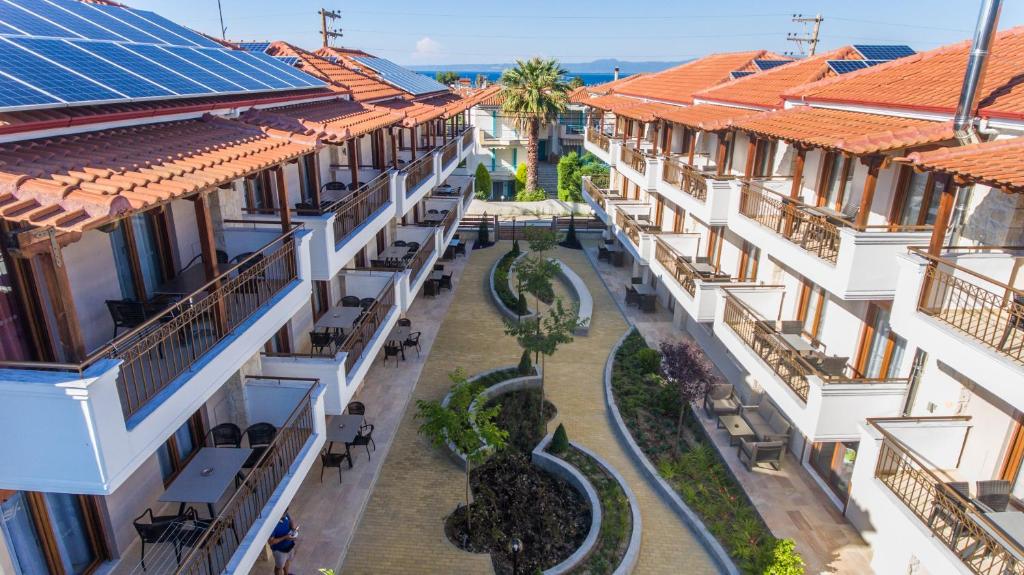 an aerial view of the courtyard of a building at Apanemia by Flegra Hotels in Pefkochori