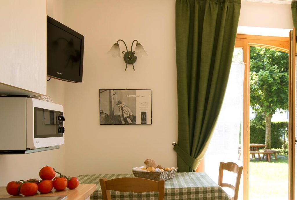 Kuchyň nebo kuchyňský kout v ubytování Residence Rio Piccolo