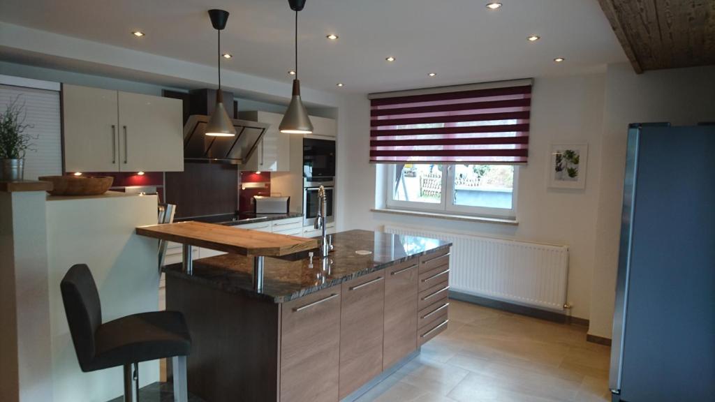 Kuchyň nebo kuchyňský kout v ubytování Inn-Apartments
