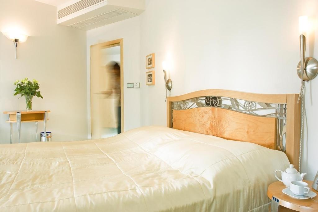 Postel nebo postele na pokoji v ubytování Hotel SET