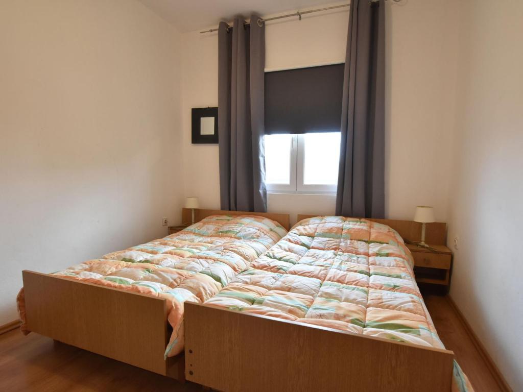 Postel nebo postele na pokoji v ubytování Apartment in Knin near Knin Fortress
