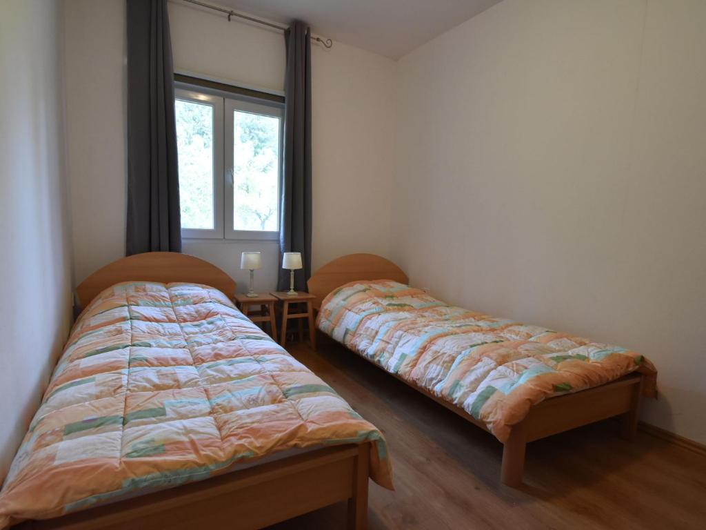 Postel nebo postele na pokoji v ubytování Apartment in Knin near Knin Fortress