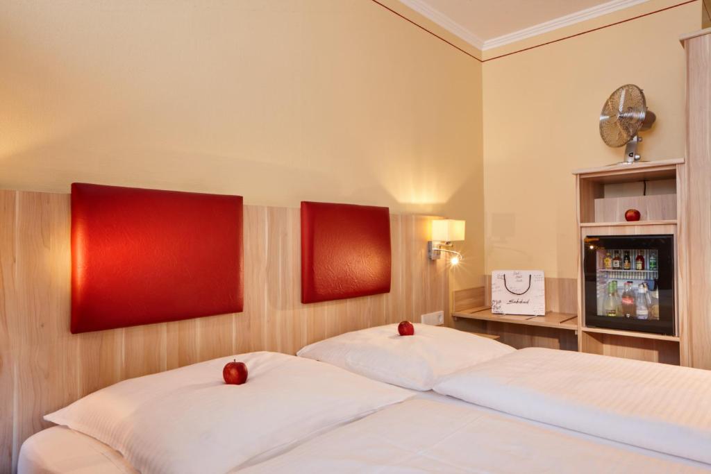 Postel nebo postele na pokoji v ubytování Hotel Concorde