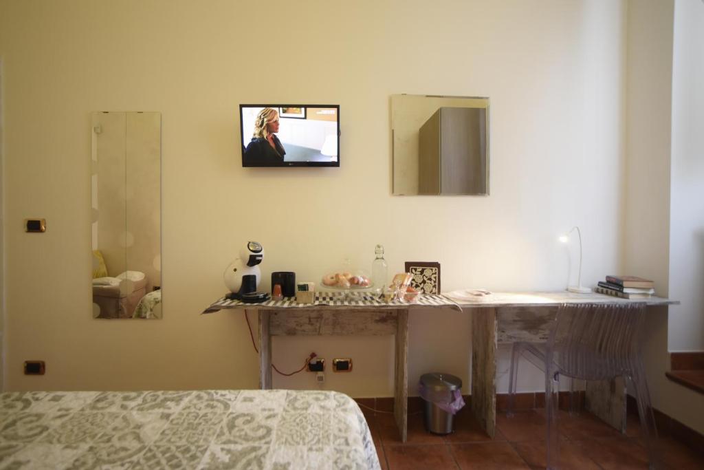 TV a/nebo společenská místnost v ubytování Da Noi Due
