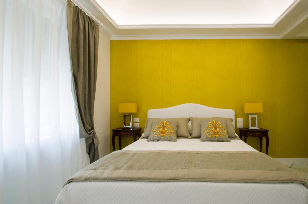 A bed or beds in a room at B&B Maiori Luxury