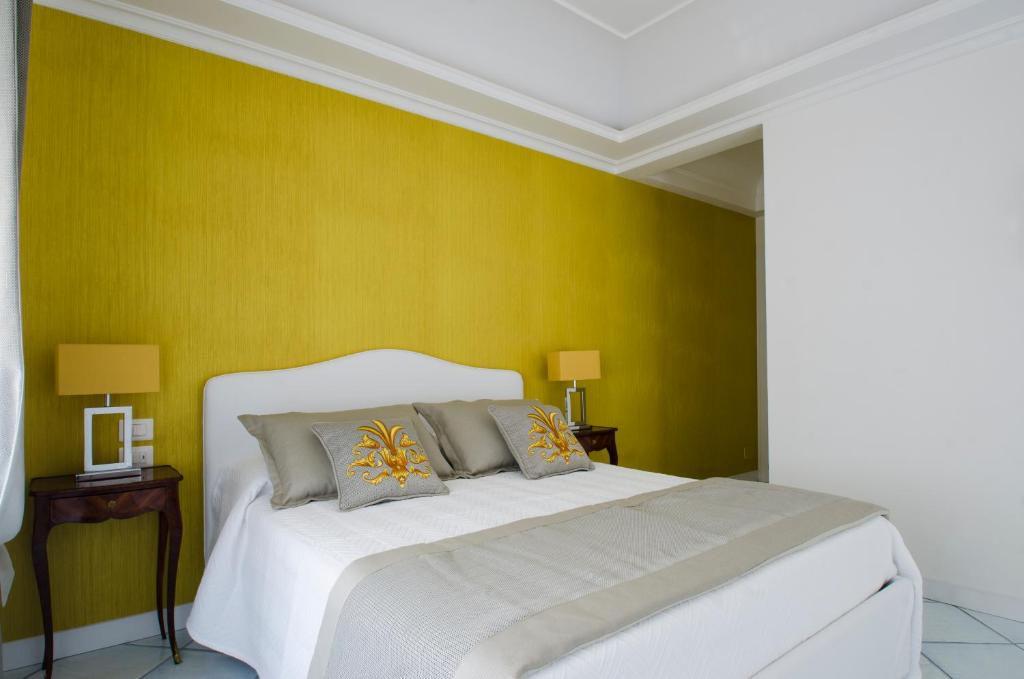 A bed or beds in a room at B&B Maiori Luxury