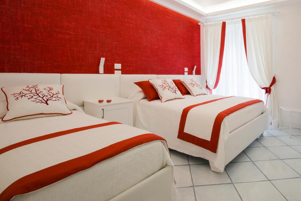 A bed or beds in a room at B&B Maiori Luxury