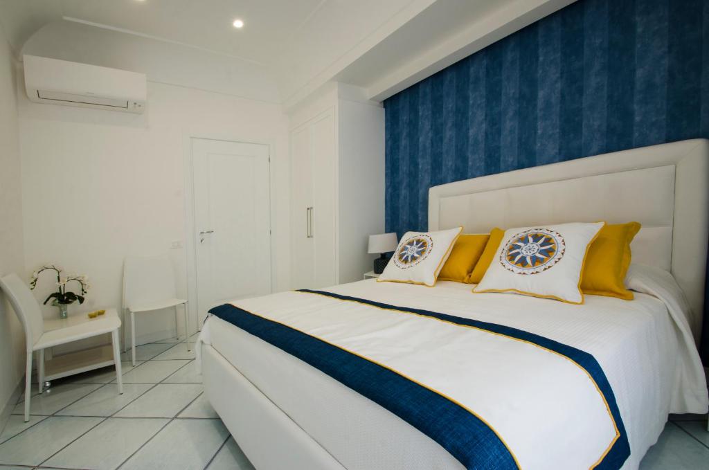 A bed or beds in a room at B&B Maiori Luxury