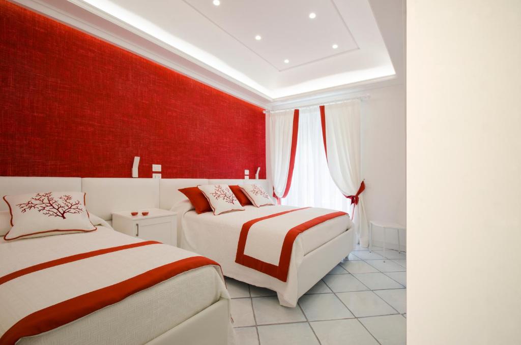 A bed or beds in a room at B&B Maiori Luxury