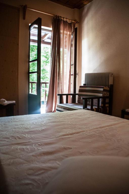 Łóżko lub łóżka w pokoju w obiekcie Christofer's Rooms