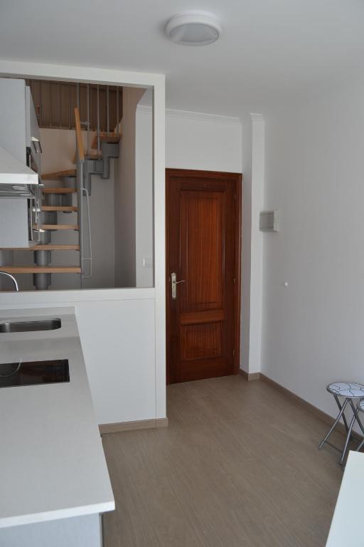 Kuchyňa alebo kuchynka v ubytovaní Apartamentos Pacheca