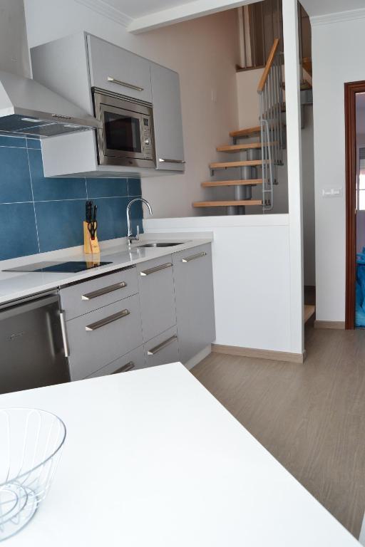Kuchyňa alebo kuchynka v ubytovaní Apartamentos Pacheca