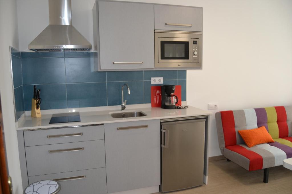 Kuchyňa alebo kuchynka v ubytovaní Apartamentos Pacheca