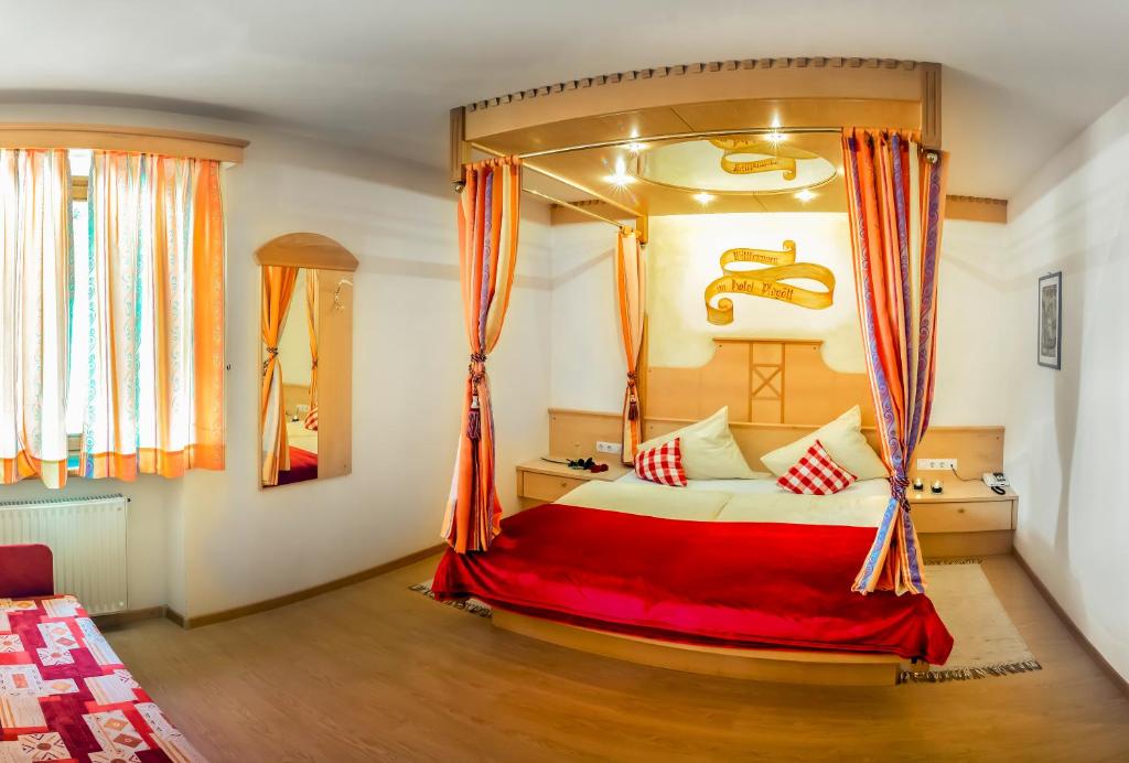 Postel nebo postele na pokoji v ubytování Berghotel Plagött