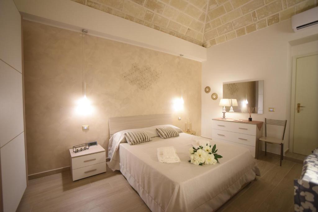 Postel nebo postele na pokoji v ubytování CASA FELICE Maison de Charme