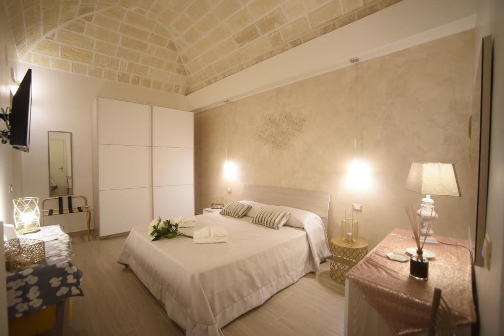 Postel nebo postele na pokoji v ubytování CASA FELICE Maison de Charme
