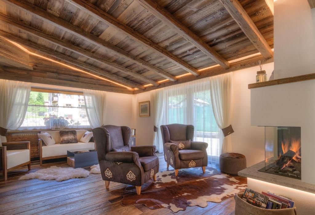 Posezení v ubytování Renè Dolomites Boutique Hotel