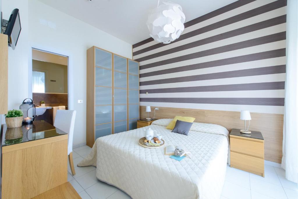 Postel nebo postele na pokoji v ubytování Hotel Esplanade