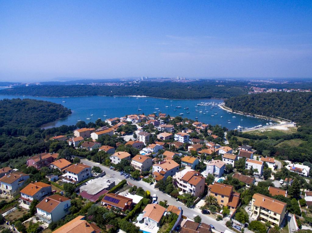 an aerial view of a town and a river at "Andrija" apartmen's in Banjole