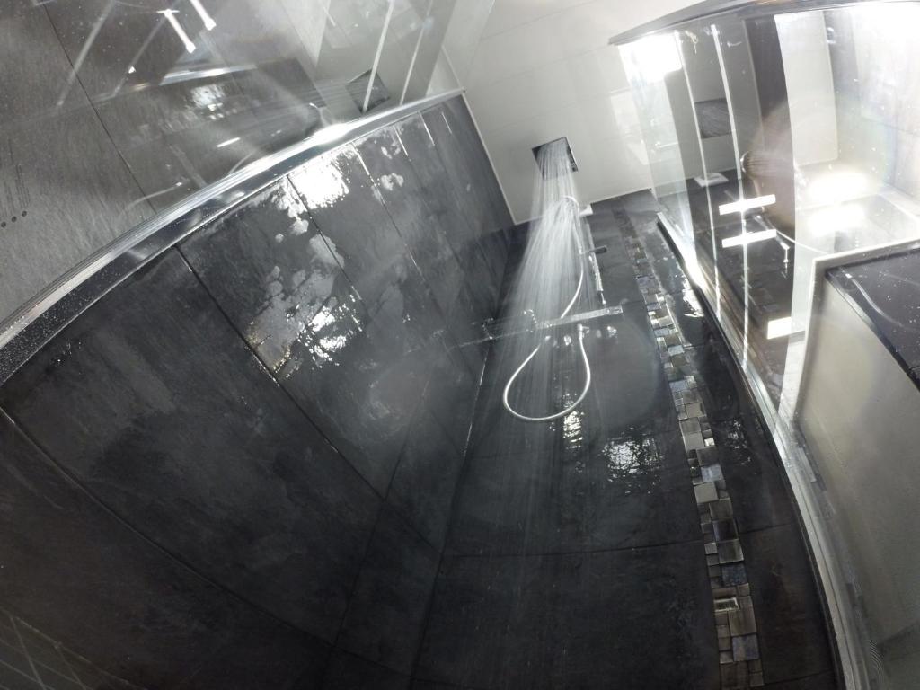 an overhead view of a bathroom with a toilet in a room at Catalans in Marseille