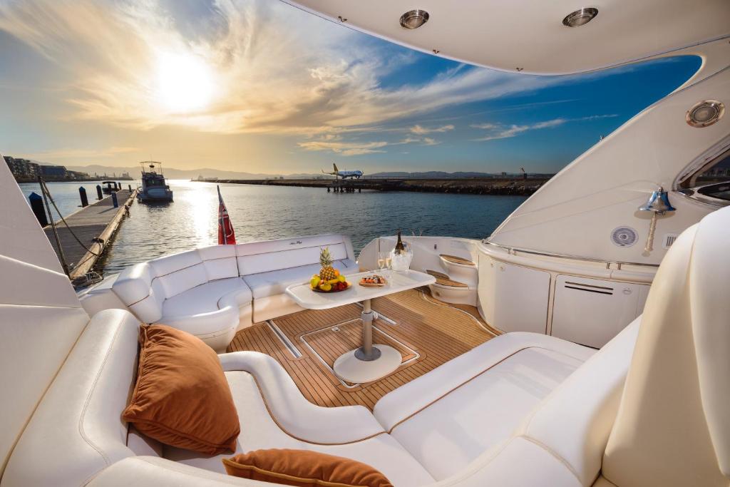 a view from the back of a boat in the water at Luxury Yacht Hotel in Gibraltar