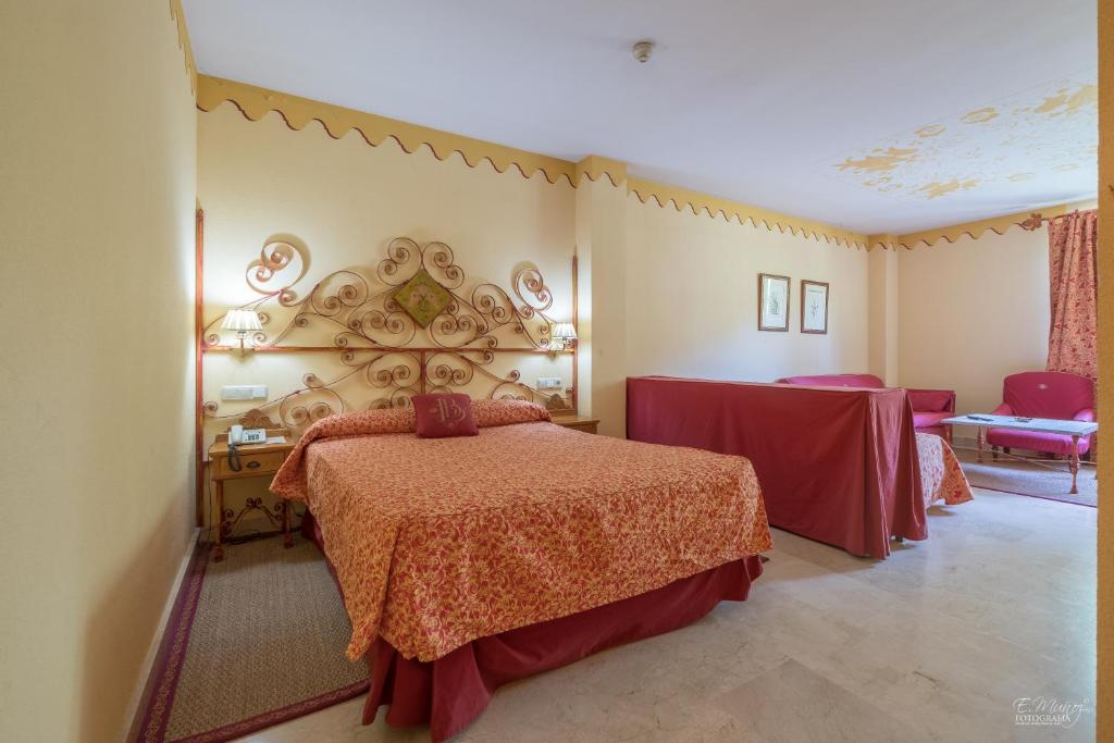 Postel nebo postele na pokoji v ubytování Hotel Batuecas