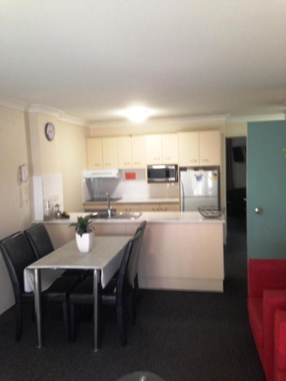 Kuchyň nebo kuchyňský kout v ubytování Beaches Serviced Apartments