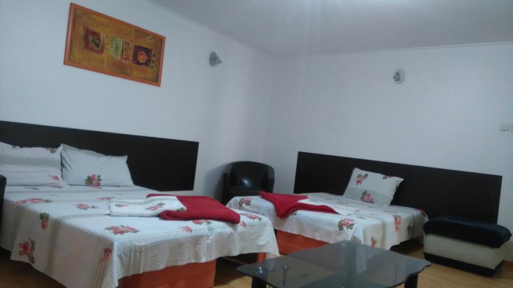 Postel nebo postele na pokoji v ubytování Zoi Residence