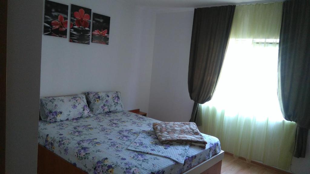 Postel nebo postele na pokoji v ubytování Zoi Residence