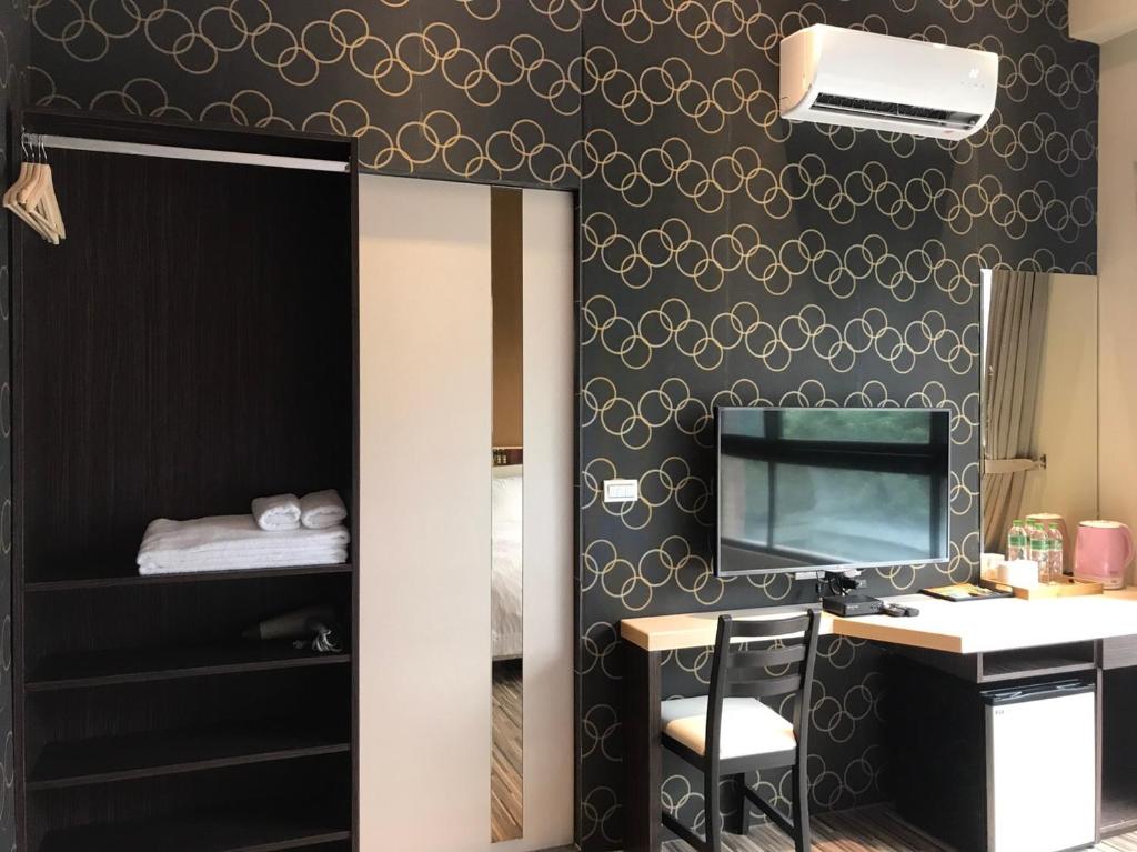 Kuchyň nebo kuchyňský kout v ubytování Ruo Shui Hotspring Hotel
