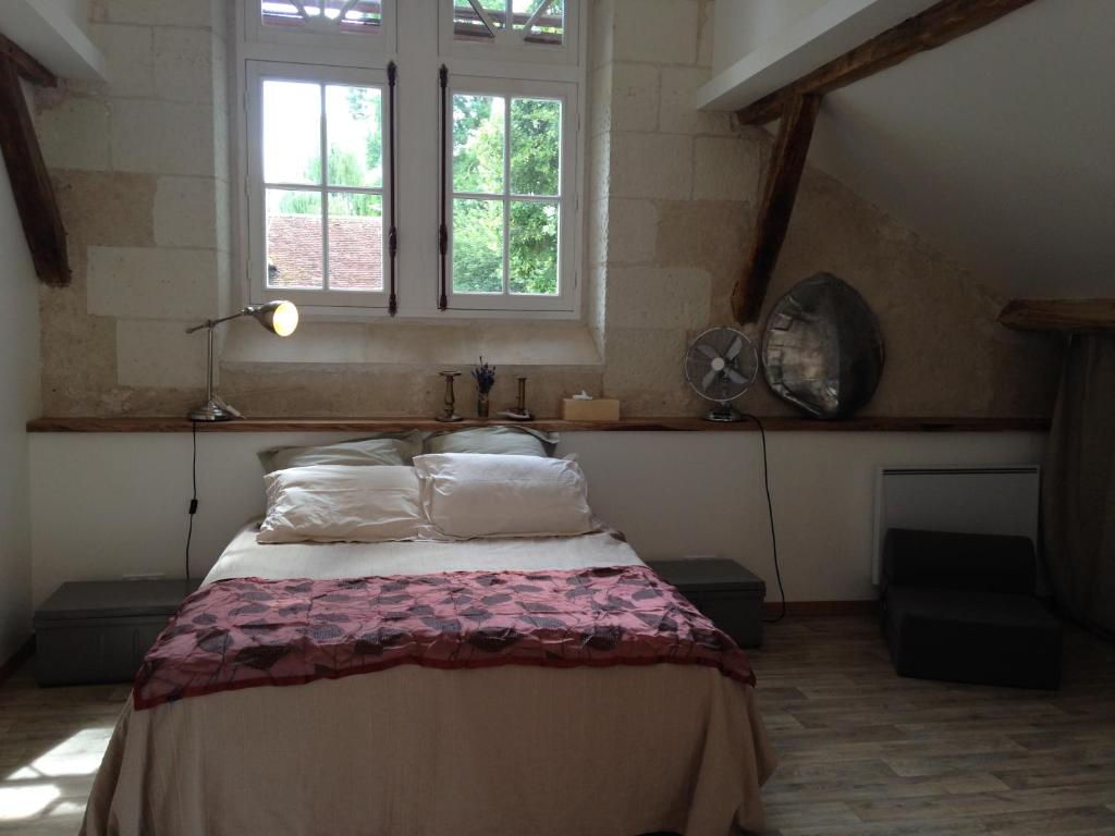 Postel nebo postele na pokoji v ubytování studio avec terrasse Abbaye d'Aiguevive
