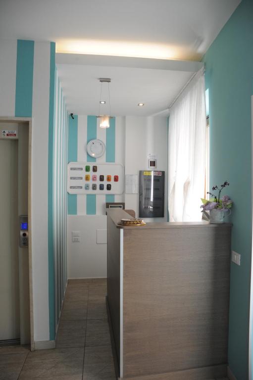 Kuchyň nebo kuchyňský kout v ubytování GG8 Hotel & Suite SPA