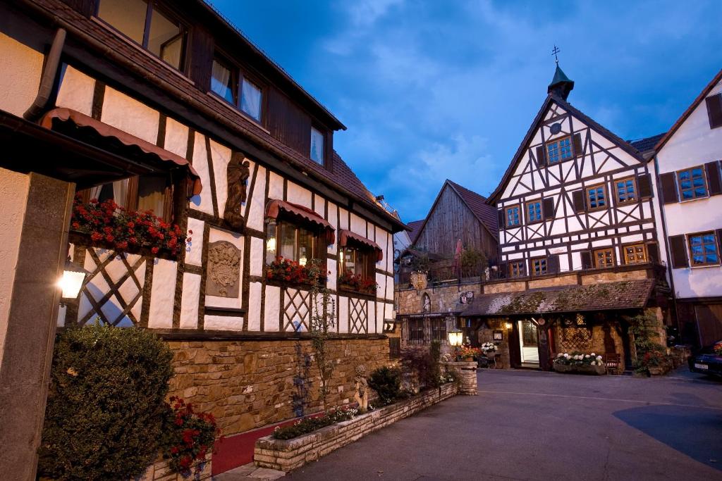 a street in a medieval town with buildings at Hotel Traube in Stuttgart
