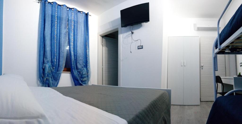 Postel nebo postele na pokoji v ubytování L'angolo di Nina
