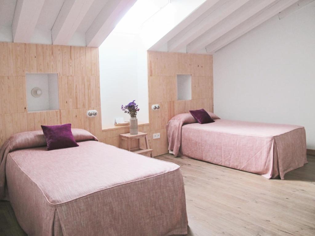 Postel nebo postele na pokoji v ubytování Hotel Ayllon