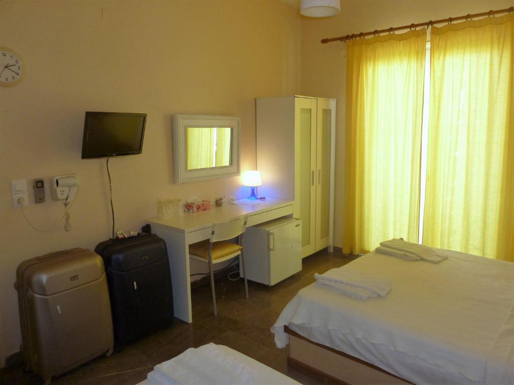 Łóżko lub łóżka w pokoju w obiekcie Zoe Pension