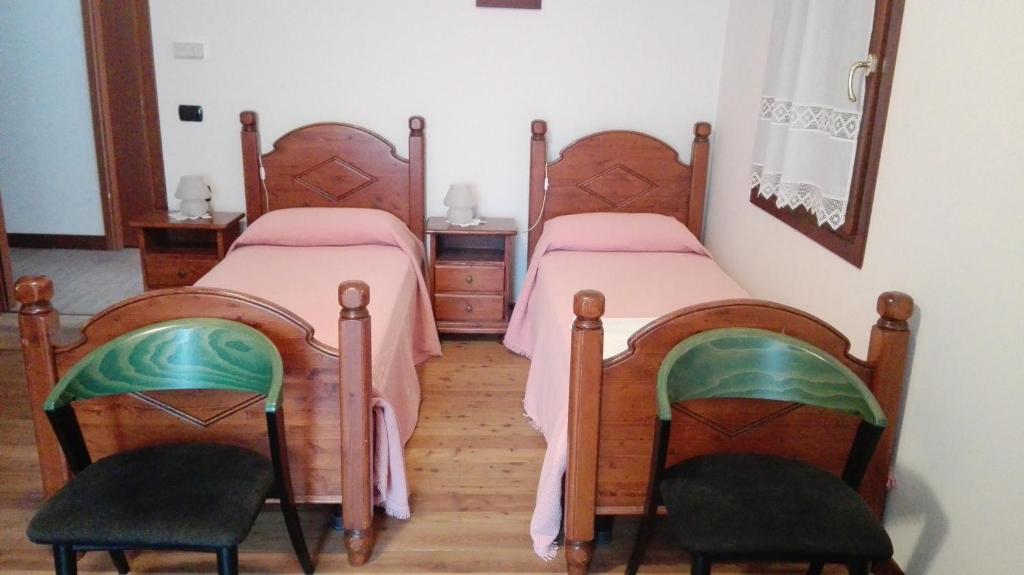 Posteľ alebo postele v izbe v ubytovaní Agriturismo Il Salice Ridente