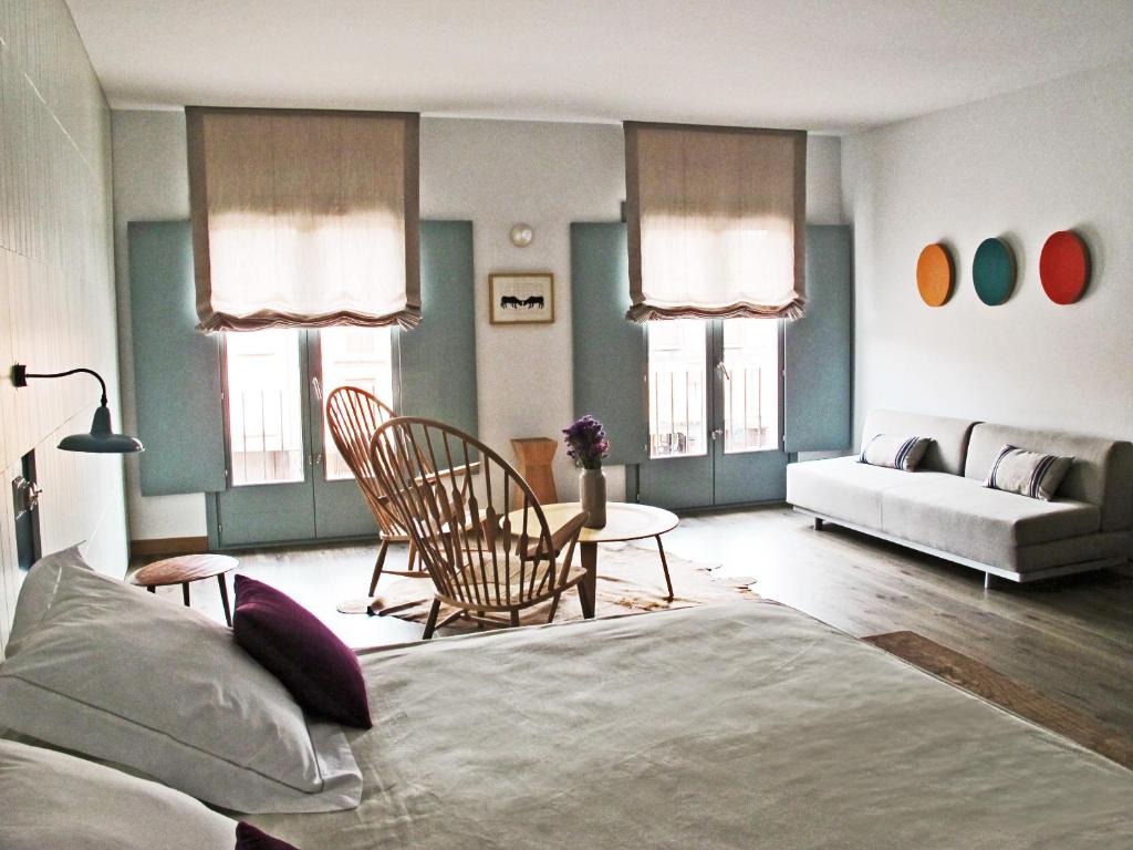 Postel nebo postele na pokoji v ubytování Hotel Ayllon