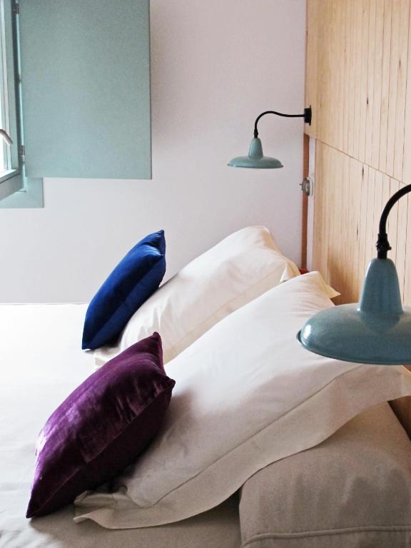 Postel nebo postele na pokoji v ubytování Hotel Ayllon