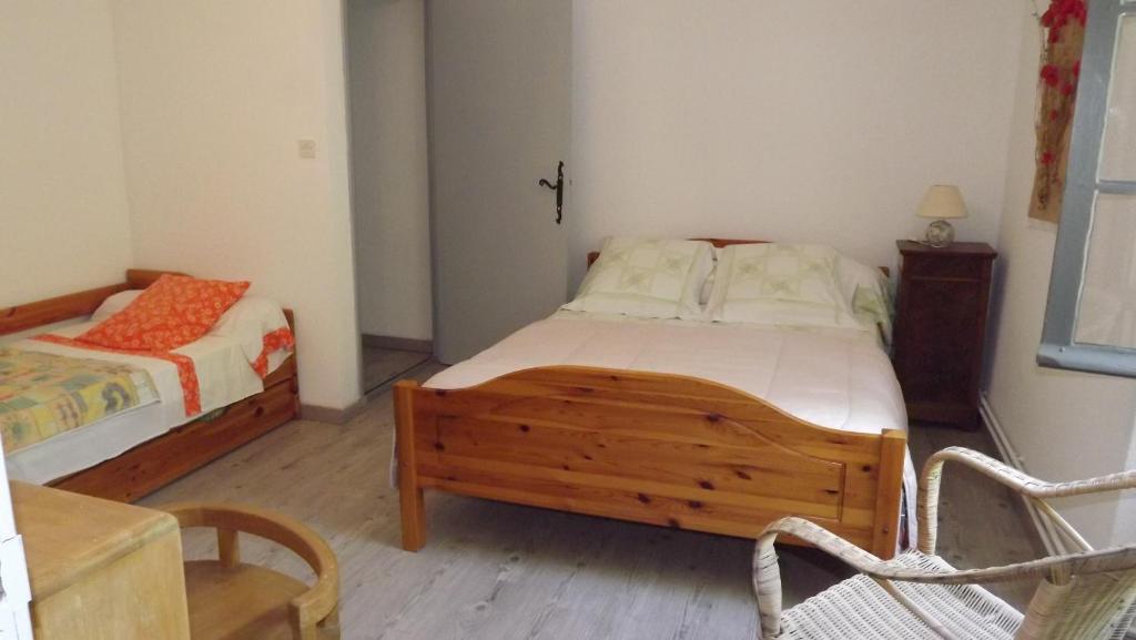 Postel nebo postele na pokoji v ubytování La Bastide